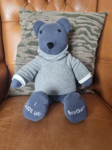 grey personalised memory bear wearing a handmade hoodie