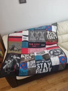 finished patchwork memory blanket made from a collection of meaningful T-shirts