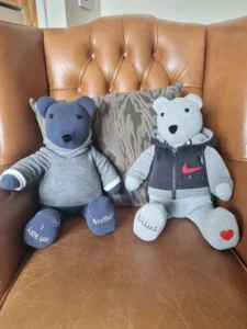 two personalised memory bears wearing handmade hoodies and waistcoats
