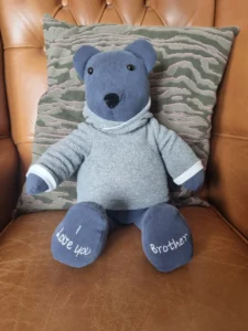 grey personalised memory bear wearing a handmade hoodie