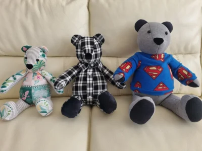 three handmade memory bears created from different meaningful clothes
