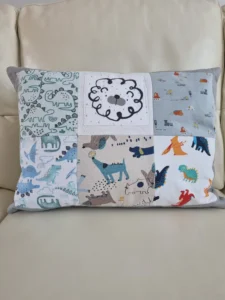 handmade memory cushion made from colourful character clothing